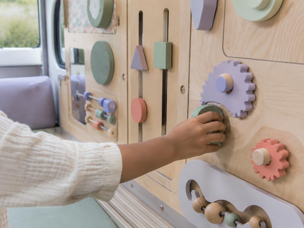 Concept visualization of a child using cause-and-effect sensory wall elements